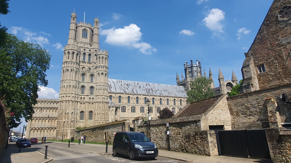 The West Tower and the long nave from the street, the Octagon beyond The West Tower and the long nave from the street, the Octagon beyond