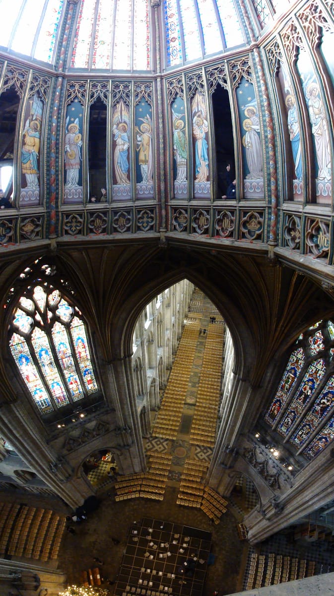 Through an open screen, down into the nave Through an open screen, down into the nave