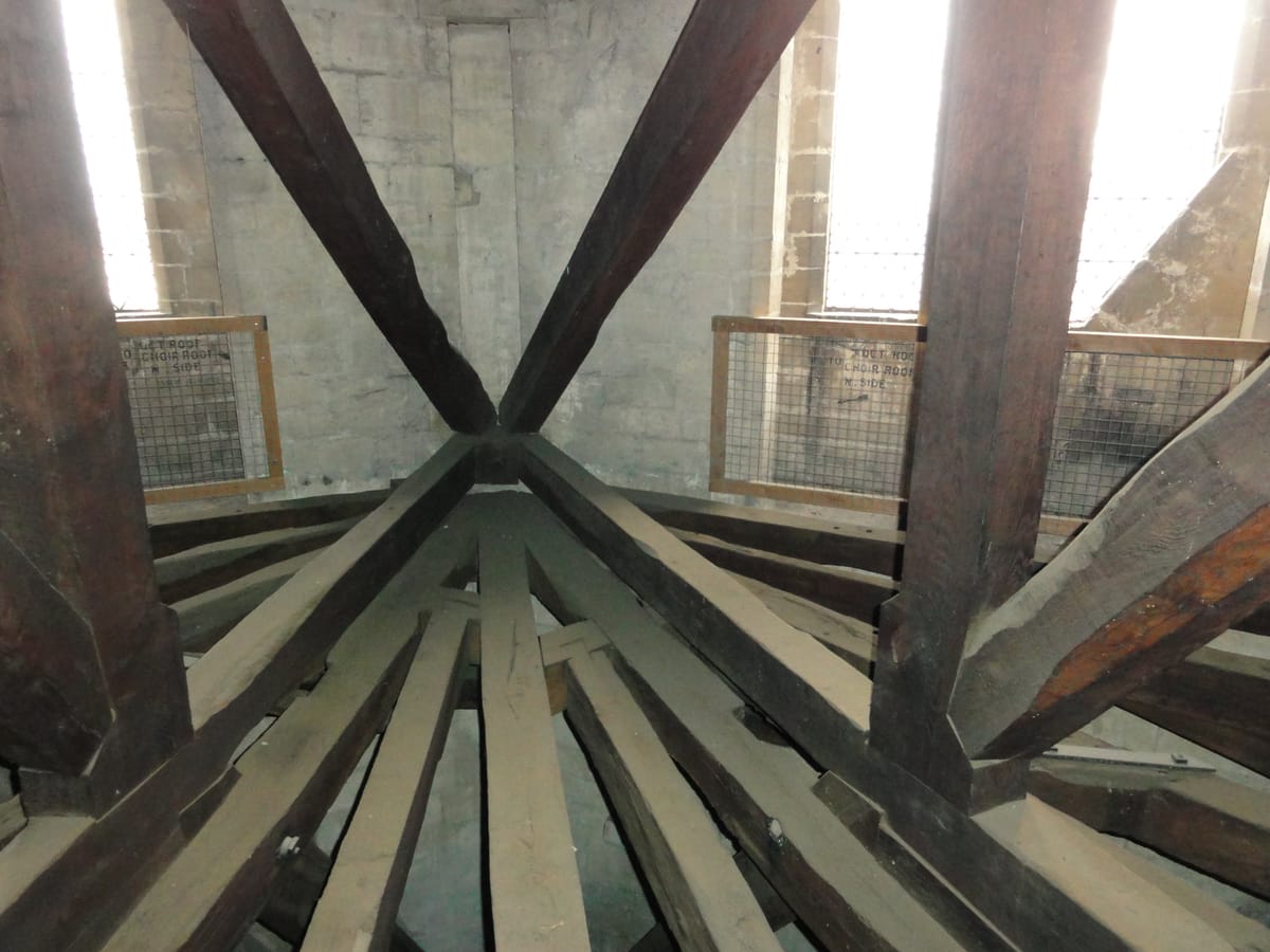 Roof timbers inside the tower, signposted for the roof crawls Roof timbers inside the tower, signposted for the roof crawls