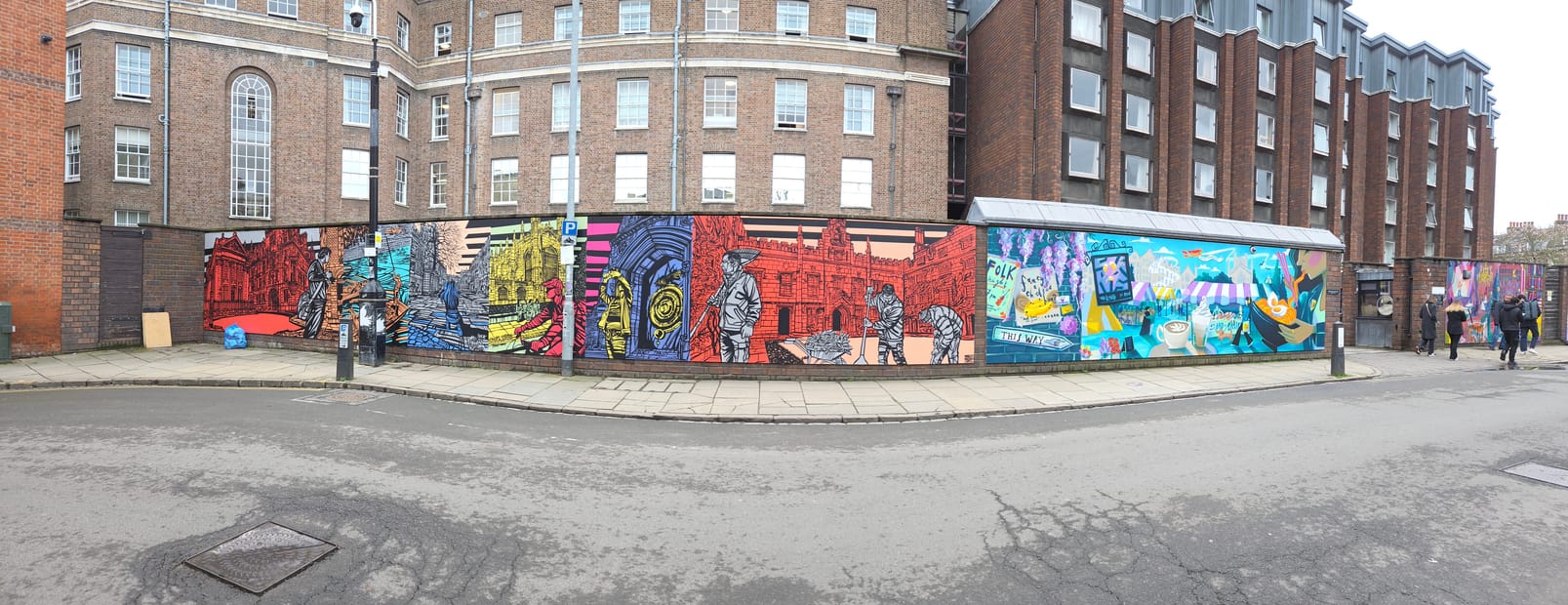 Cambridge in lino-cut — King's Parade, the Chronophage and college gardeners