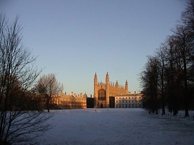 Kings College Chapel in snow at dusk