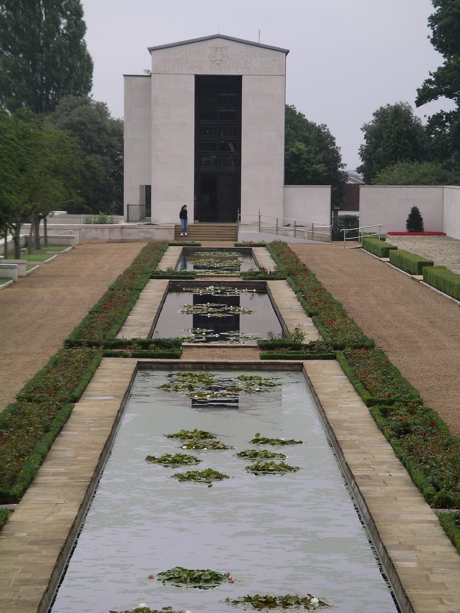 The memorial chapel, seen along the reflecting pools The memorial chapel, seen along the reflecting pools