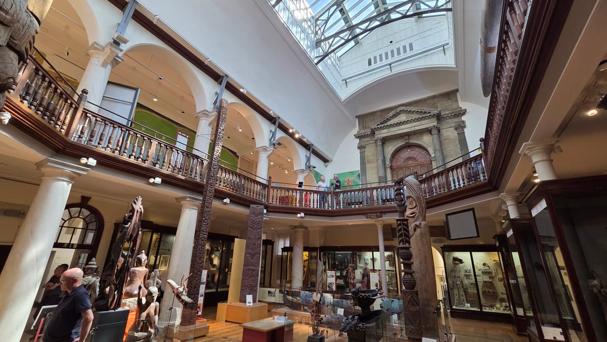 The galleried Maudslay Hall, carved poles rising through both floors The galleried Maudslay Hall, carved poles rising through both floors
