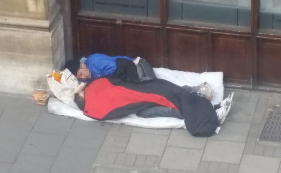 Two rough sleepers in Cambridge city centre.
